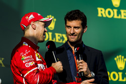 Sebastian Vettel, Ferrari, 1st Position, is interviewed by Mark Webber on the podium