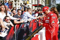 Kimi Raikkonen, Ferrari, meets some fans
