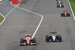 Sebastian Vettel, Ferrari SF16-H and Sergio Perez, Sahara Force India F1 VJM09 battle for position