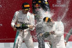 The podium (L to R): Nico Rosberg, Mercedes AMG F1, second; Lewis Hamilton, Mercedes AMG F1, race winner; celebrate with champagne