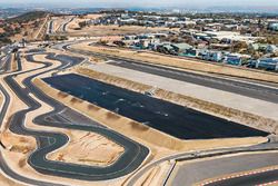 Dynamic handling track, skidpan and upper exhibition platform