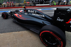 Jenson Button, McLaren MP4-31 leaves the pits