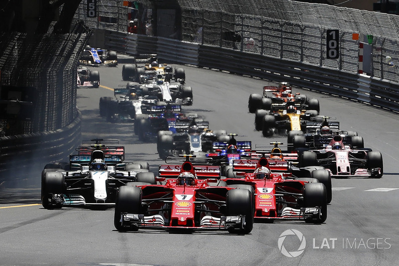 Kimi Raikkonen, Ferrari SF70-H leads Sebastian Vettel, Ferrari SF70-H at the start of the race