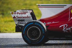 Kimi Raikkonen, Ferrari SF70H, Pirelli rear wheel, shark fin, and rear wing detail