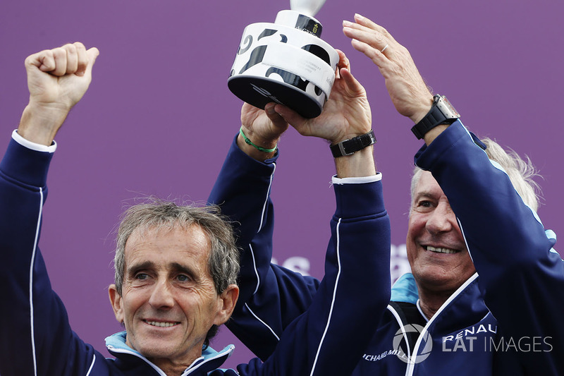 Alain Prost and Jean Paul Driot celebrate on the podium