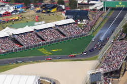Lewis Hamilton, Mercedes AMG F1 W08, leads Sebastian Vettel, Ferrari SF70H, Valtteri Bottas, Mercedes AMG F1 W08, Kimi Raikkonen, Ferrari SF70H, Max Verstappen, Red Bull Racing RB13, and the rest of the field at the start