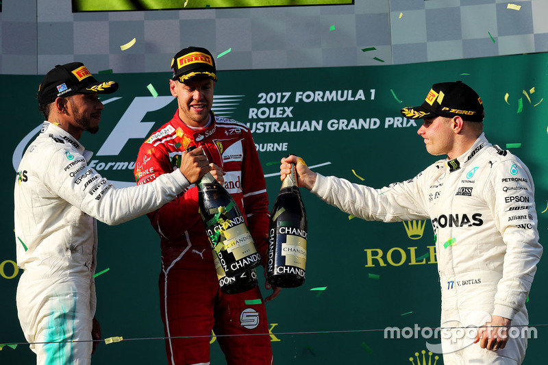 Podium: winner Sebastian Vettel, Ferrari, second place Lewis Hamilton, Mercedes AMG F1, third place 