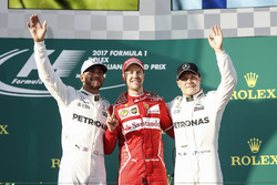 Lewis Hamilton, Mercedes AMG, 2nd Position, Sebastian Vettel, Ferrari, 1st Position, and Valtteri Bo