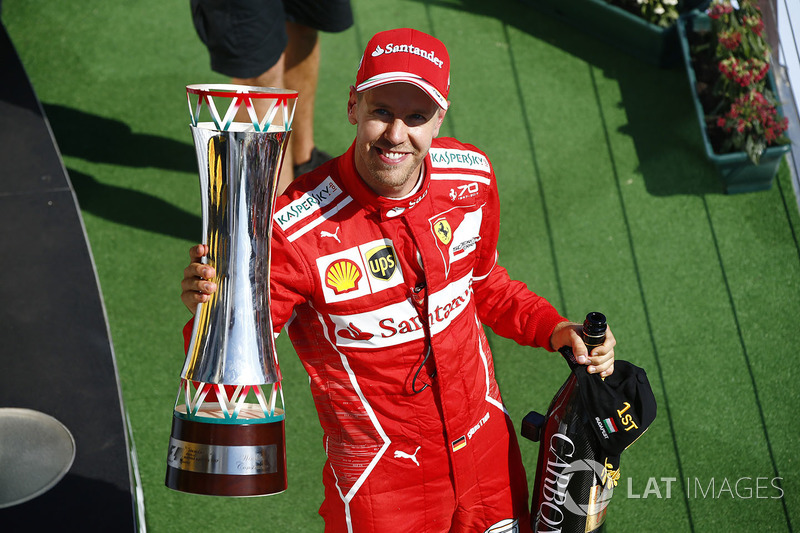 Podium: race winner Sebastian Vettel, Ferrari