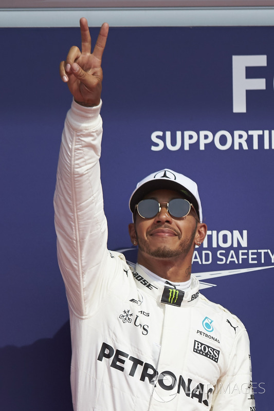 Pole man Lewis Hamilton, Mercedes AMG F1, celebrates a record equalling 68th pole start