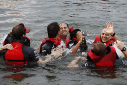 The McLaren raft team celebrate victory
