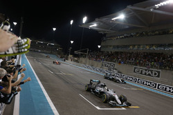 Race winner Lewis Hamilton, Mercedes AMG F1 W07 Hybrid crosses the finish line at the end of the race with second place World Champion Nico Rosberg, Mercedes AMG F1 W07 Hybrid