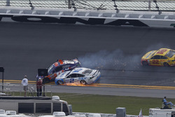 Denny Hamlin, Joe Gibbs Racing Toyota, collides with Brad Keselowski, Team Penske Ford