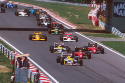Nigel Mansell, Williams FW11B Honda, lidera a Gerhard Berger, Ferrari F187, Michele Alboreto, Ferrari F187, Nelson Piquet, Williams FW11B Honda, Alain Prost, McLaren MP4/3 TAG Porsche, y Ayrton Senna, Team Lotus Honda 99T