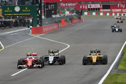 Kimi Raikkonen, Ferrari SF16-H battle for position with Sergio Perez, Sahara Force India F1 VJM09 an
