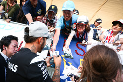 Lewis Hamilton, Mercedes AMG F1 signs autographs for the fans in the grandstand