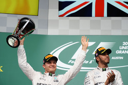 (L to R): Nico Rosberg, Mercedes AMG F1 celebrates his second position on the podium with race winner Lewis Hamilton, Mercedes AMG F1