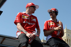 Kimi Raikkonen, Scuderia Ferrari and team-mate Sebastian Vettel, Scuderia Ferrari