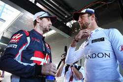 Romain Grosjean, Haas F1 Team with Jenson Button, McLaren