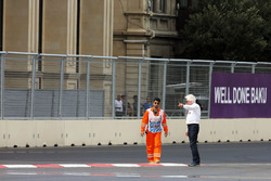 Charlie Whiting, FIA Delegate inspects the circuit after GP2 qualifying is postponed