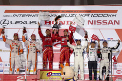 Podium GT500: race winners #38 Team Zent Cerumo Lexus RC F: Yuji Tachikawa, Hiroaki Ishiura, second place #36 Team Tom's Lexus RC F: Daisuke Ito, James Rossiter, third place #46 Mola Nissan GT-R: Satoshi Motoyama, Mitsunori Takaboshi