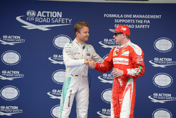 Polesitter Nico Rosberg, Mercedes AMG F1 Team and Kimi Raikkonen, Ferrari