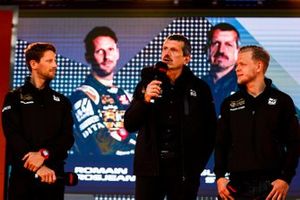 Romain Grosjean, Haas F1 Team, Guenther Steiner, Team Principal, Haas F1 and Kevin Magnussen, Haas F1 Team on stage at the Federation Square event