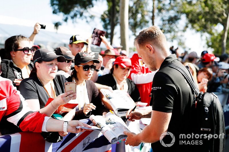 Kevin Magnussen, Haas F1 Team, signs autographs for fans