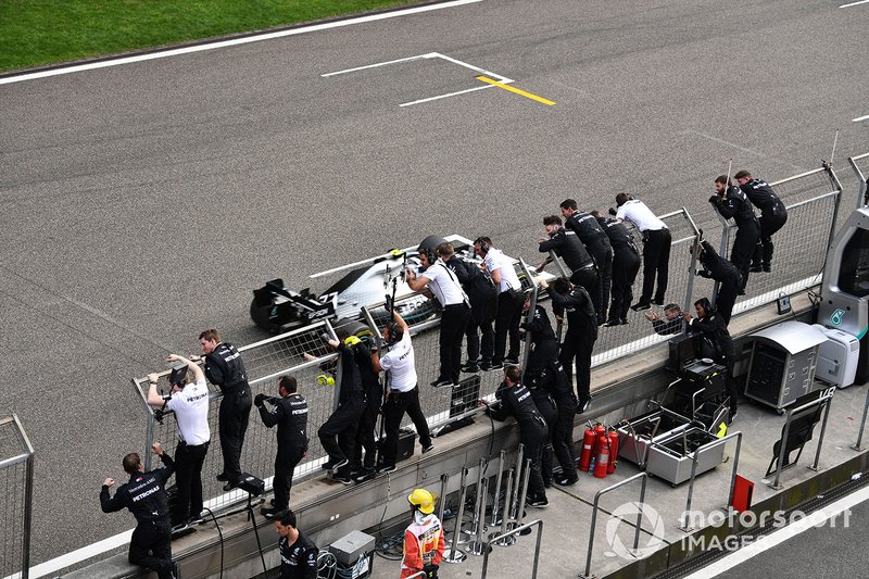 Valtteri Bottas, Mercedes AMG W10, 2nd position, passes the Mercedes pit wall