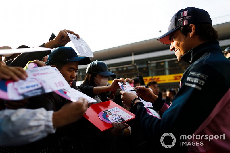 Lance Stroll, Racing Point signs an autograph for a fan