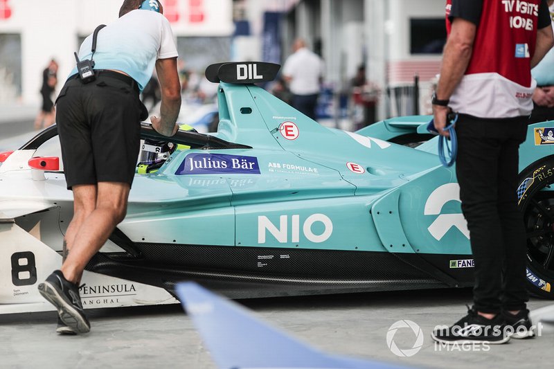 Tom Dillmann, NIO Formula E Team, NIO Sport 004, is pushed into the garage by mechanics