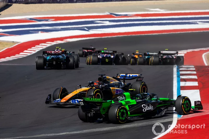 Esteban Ocon, Alpine A524, spins as Zhou Guanyu, Stake F1 Team KICK Sauber C44, avoids him