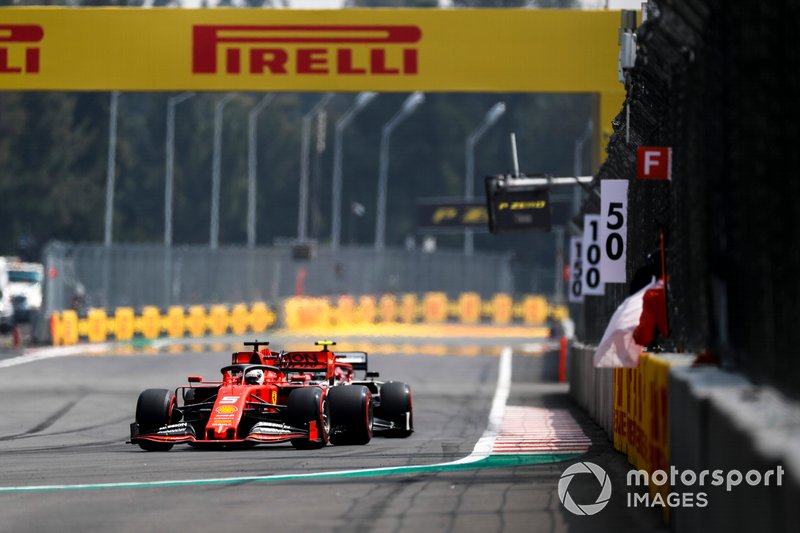 Sebastian Vettel, Ferrari SF90, leads Antonio Giovinazzi, Alfa Romeo Racing C38