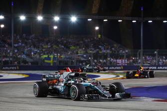 Lewis Hamilton, Mercedes AMG F1 W09 EQ Power+, leads Sebastian Vettel, Ferrari SF71H, and Max Verstappen, Red Bull Racing RB14
