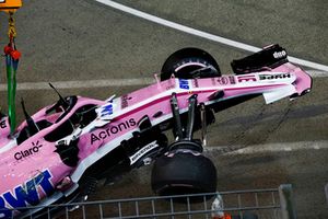 The crashed car of Esteban Ocon, Racing Point Force India VJM11 is recovered