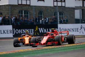 Kimi Raikkonen, Ferrari SF71H, leads Stoffel Vandoorne, McLaren MCL33