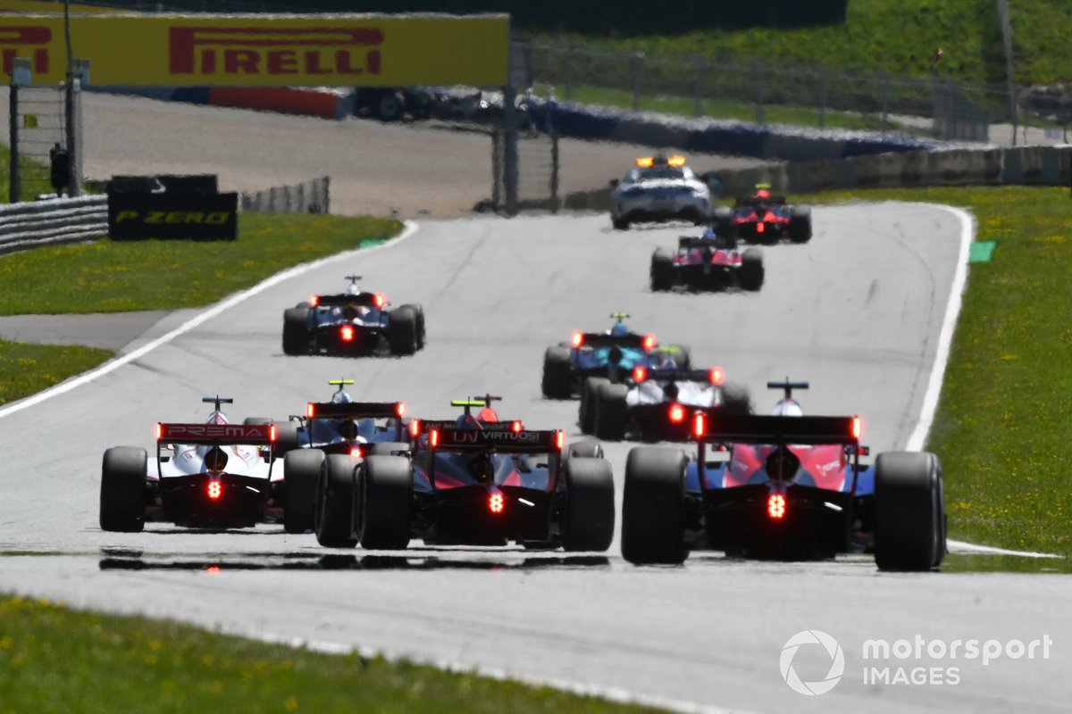 The pack behind the safety car