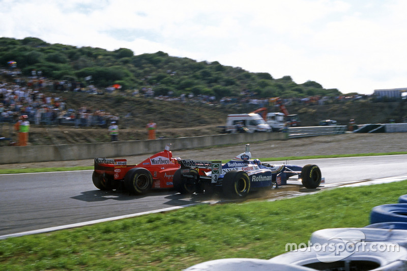 Michael Schumacher, Ferrari F310B, Jacques Villeneuve, Williams FW19 Renault