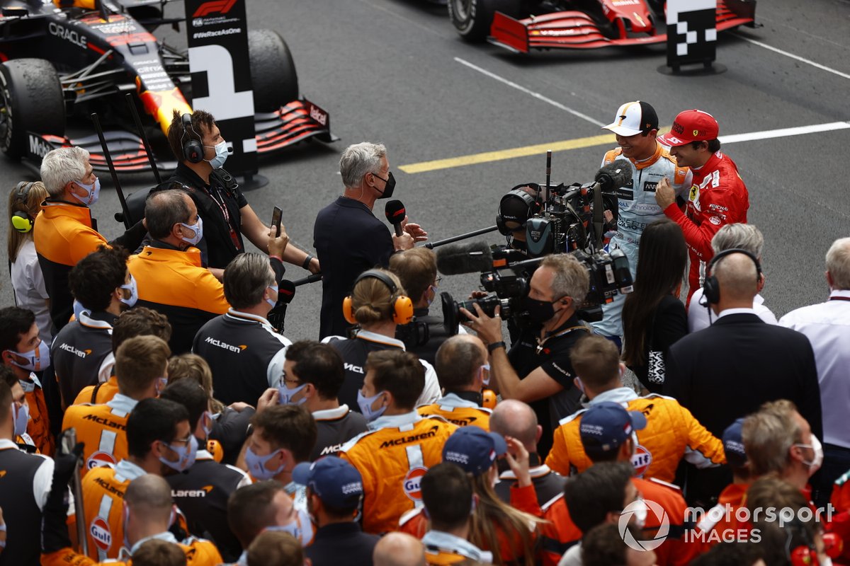 David Coulthard interviews Lando Norris, McLaren, 3rd position, and Carlos Sainz Jr., Ferrari, 2nd position, after the race