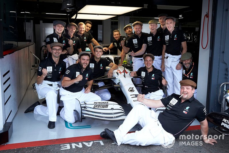 Mercedes AMG F1 team members dressed in 1950's clothing to celebrate Mercedes 125th year in Motorsport