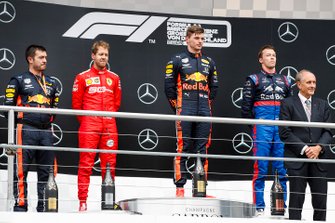Max Verstappen, Red Bull Racing, second place Sebastian Vettel, Ferrari, third place Daniil Kvyat, Toro Rosso