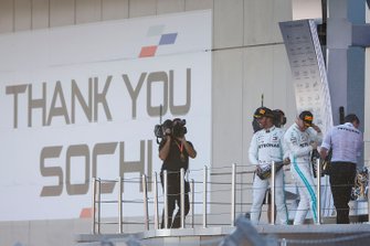 Race winner Lewis Hamilton, Mercedes AMG F1 and Valtteri Bottas, Mercedes AMG W10 spray champagne on the podium