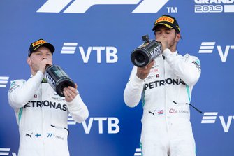 second place Valtteri Bottas, Mercedes AMG W10 and race winner Lewis Hamilton, Mercedes AMG F1 W10 drink champagne on the podium