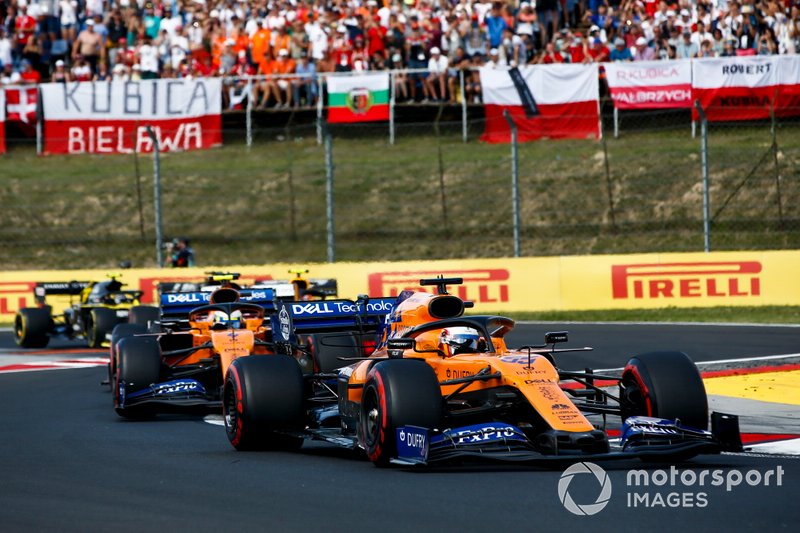 Carlos Sainz Jr., McLaren MCL34, leads Lando Norris, McLaren MCL34