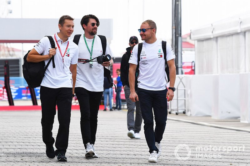 Valtteri Bottas, Mercedes AMG F1, arrives in the paddock