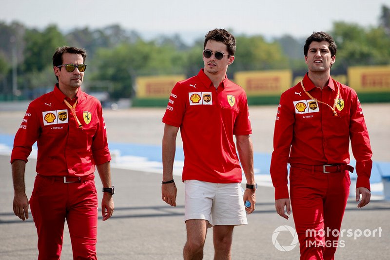 Charles Leclerc, Ferrari walks the track with his mechanics