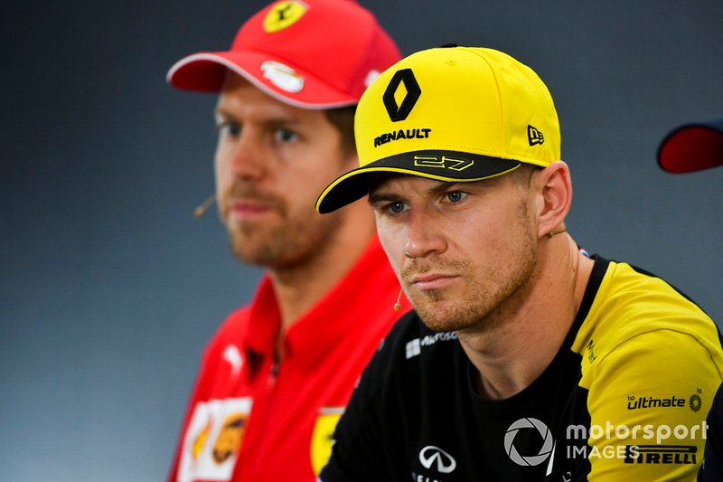 Nico Hulkenberg, Renault F1 Team and Sebastian Vettel, Ferrari In the Press Conference