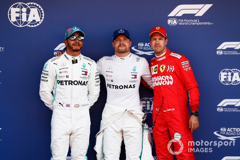 Lewis Hamilton, Mercedes AMG F1, Pole Sitter Valtteri Bottas, Mercedes AMG F1 and Sebastian Vettel, Ferrari in Parc Ferme