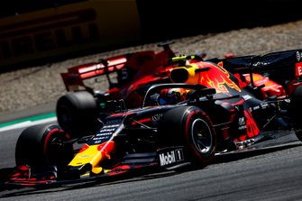 Pierre Gasly, Red Bull Racing RB15, leads Sebastian Vettel, Ferrari SF90