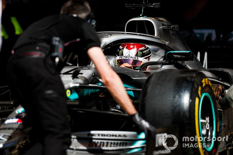 Lewis Hamilton, Mercedes AMG F1 W10, is returned to the garage